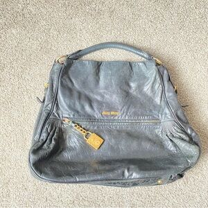 Miu Miu  Leather Bag with Gold Accents